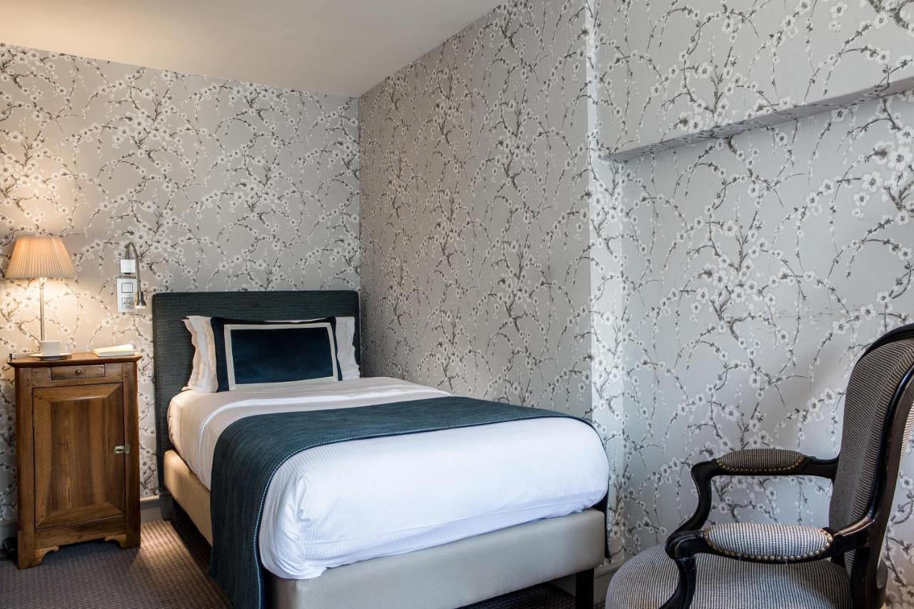 Hotel Parc Saint-Severin - Esprit De France Париж Стая снимка